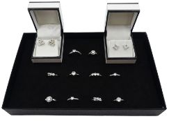Ten silver cubic zirconia dress rings and two pairs of cubic zirconia stud earrings