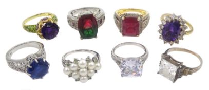 Eight silver and silver-gilt stone set dress rings including cubic zirconia dress rings