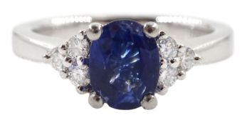 Platinum oval sapphire and six stone diamond ring