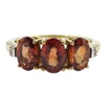 9ct gold three stone oval cognac zircon and baguette chip diamond ring