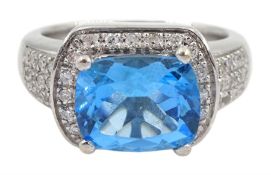 18ct white gold blue topaz and diamond cluster ring