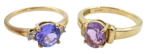 Gold three stone tanzanite and diamond ring and a gold single stone oval kunzite ring