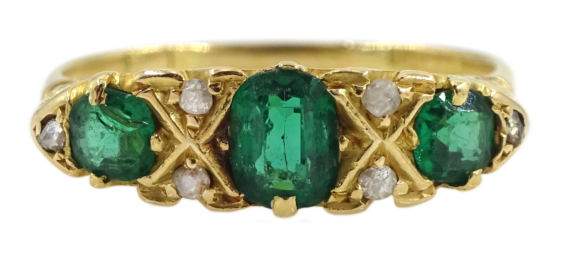 Early 20th century 18ct gold three stone emerald ring