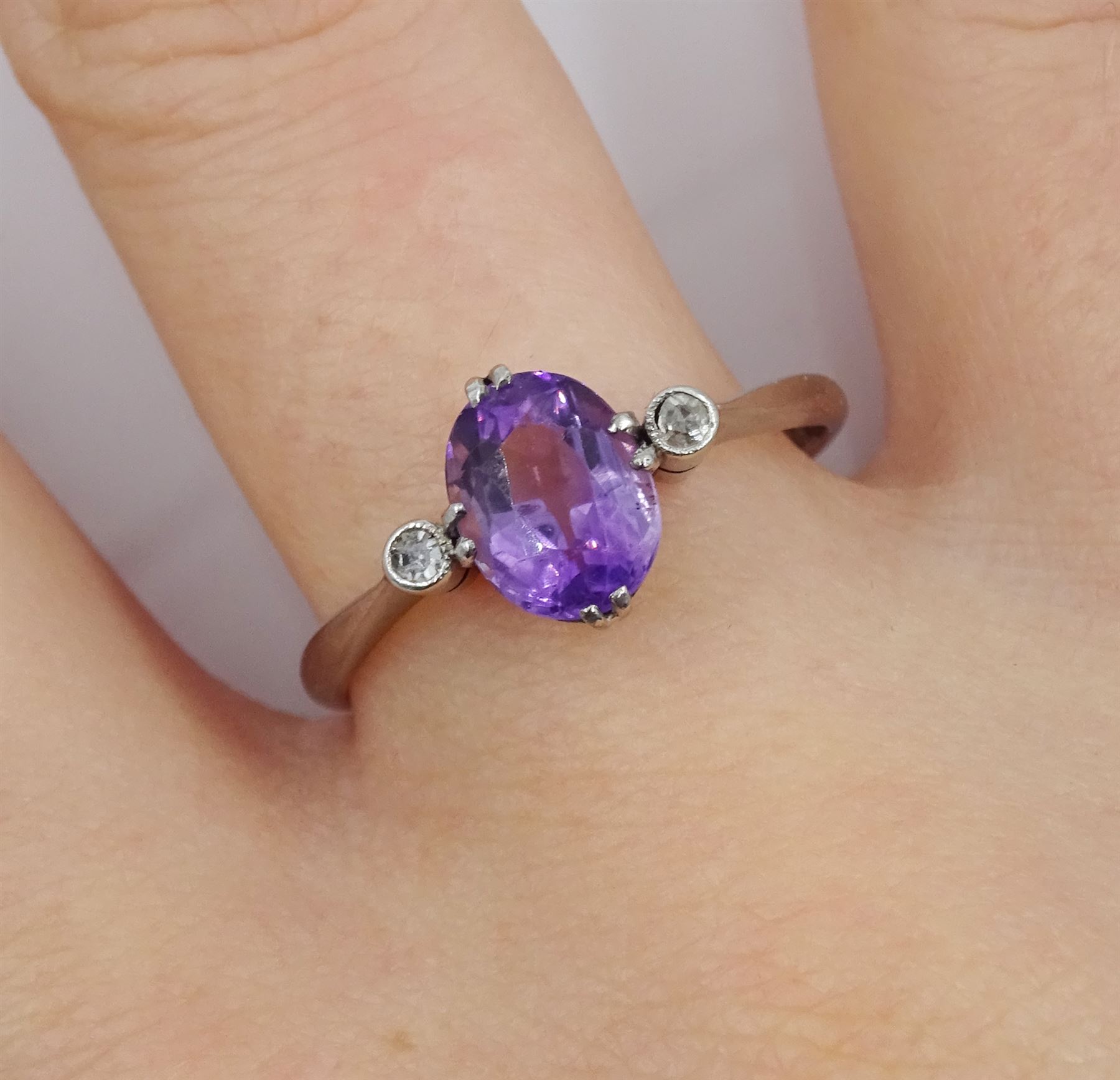 Early 20th century three stone oval amethyst and diamond chip ring - Image 2 of 4