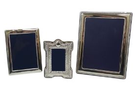 Three modern silver mounted photograph frames