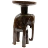 Carved wooden African elephant stand