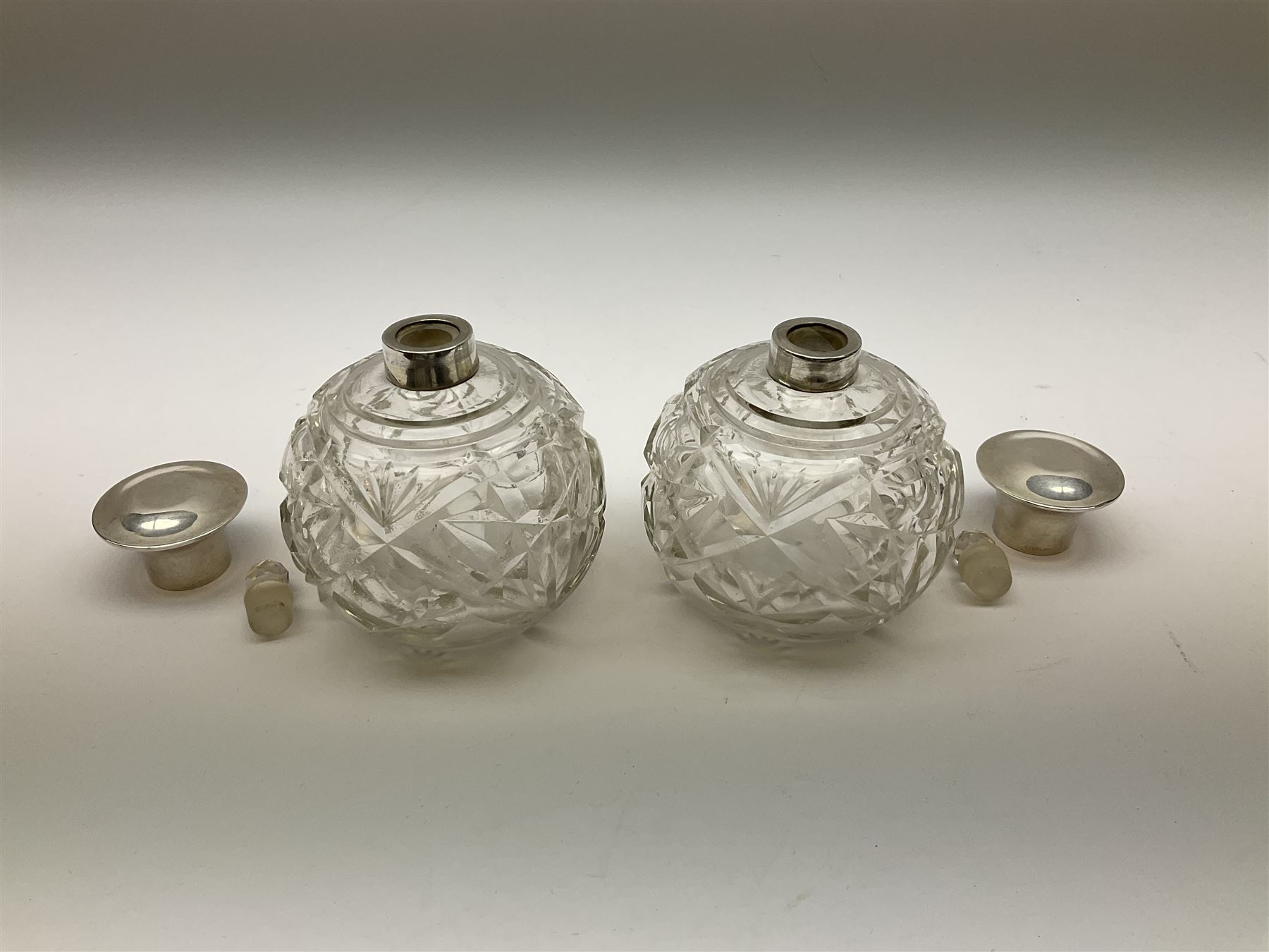 Pair of silver collared and lidded perfume bottles of bulbous form together with a pair of silver co - Image 22 of 28