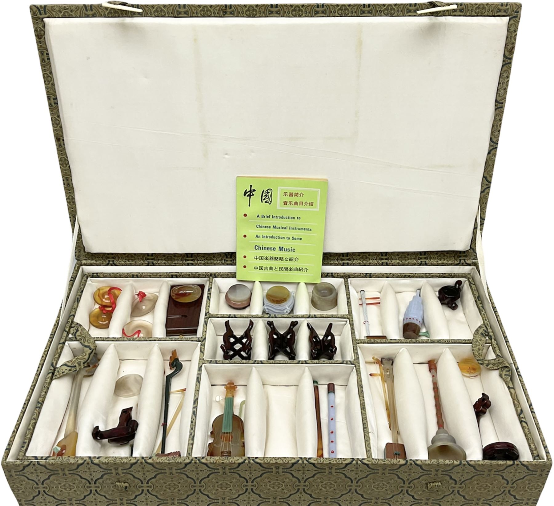 Chinese boxed collection of miniature polished hardstone musical instruments with hardwood stands