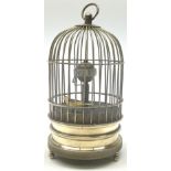 Automation bird cage of predominantly brass construction with central rotating orb and bird with pai