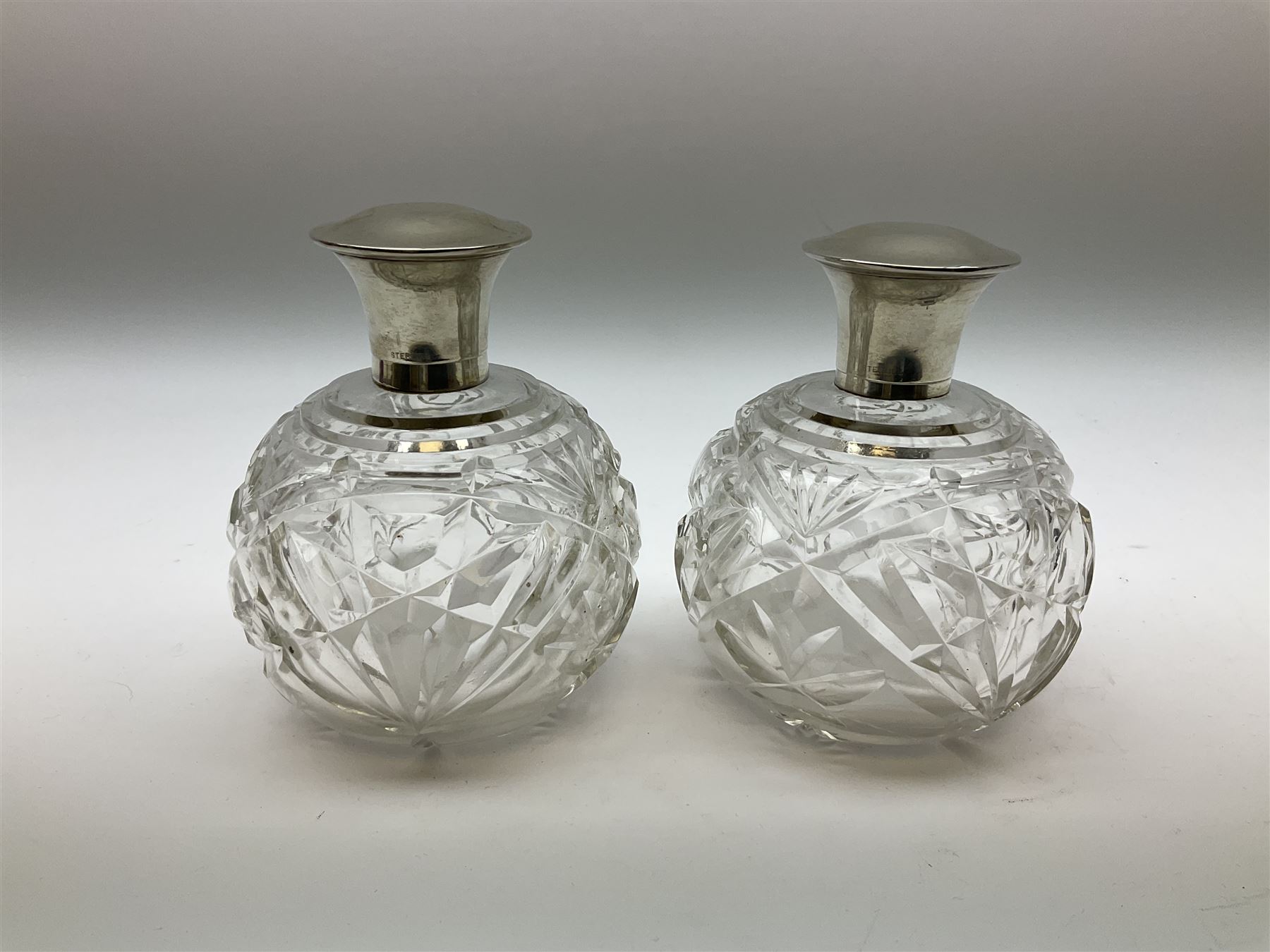 Pair of silver collared and lidded perfume bottles of bulbous form together with a pair of silver co - Image 17 of 28