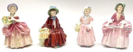 Four Royal Doulton figures