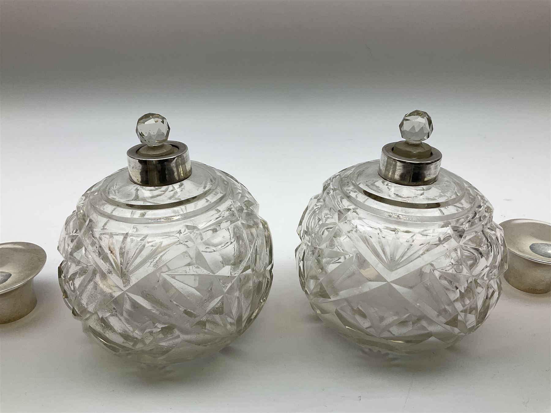 Pair of silver collared and lidded perfume bottles of bulbous form together with a pair of silver co - Image 25 of 28