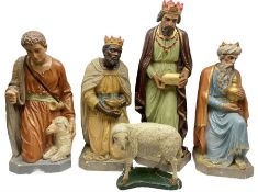 Nativity scene painted plaster figures