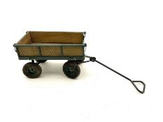 Heavy duty pull along wagon with collapsible sides and pneumatic wheels