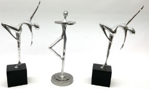 Trio of chrome figures of dancers