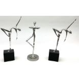 Trio of chrome figures of dancers