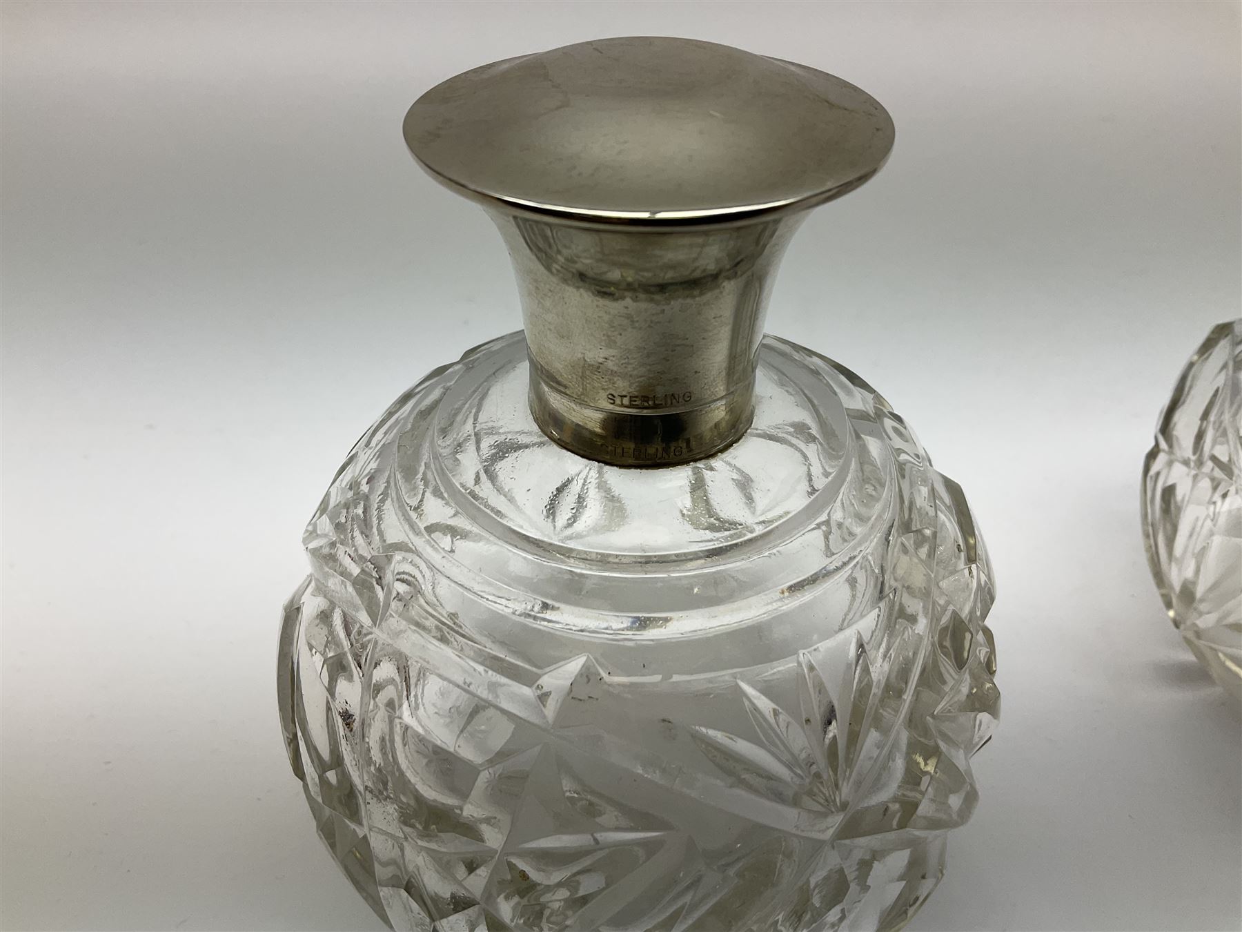 Pair of silver collared and lidded perfume bottles of bulbous form together with a pair of silver co - Image 26 of 28