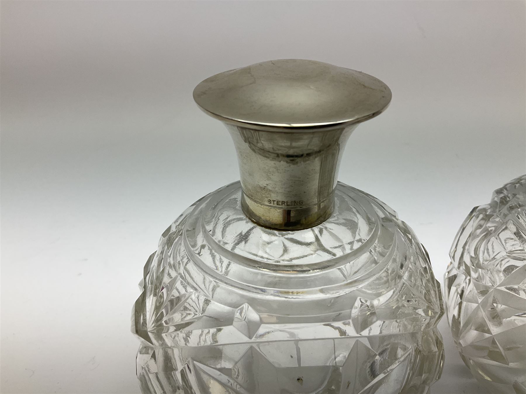 Pair of silver collared and lidded perfume bottles of bulbous form together with a pair of silver co - Image 19 of 28