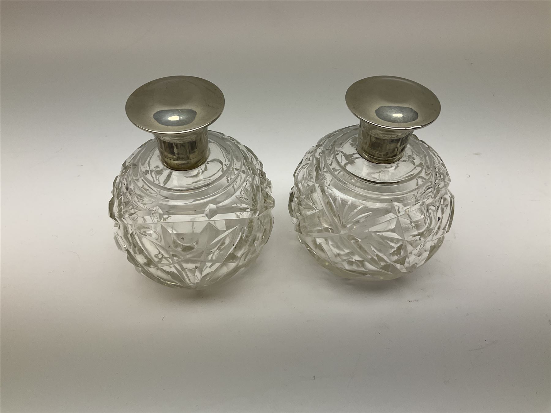 Pair of silver collared and lidded perfume bottles of bulbous form together with a pair of silver co - Image 18 of 28