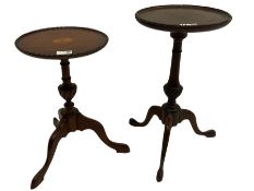 Two circular mahogany tripod wine tables