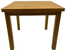 Light oak extending dining table