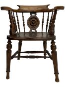 Late Victorian oak smokers bow armchair