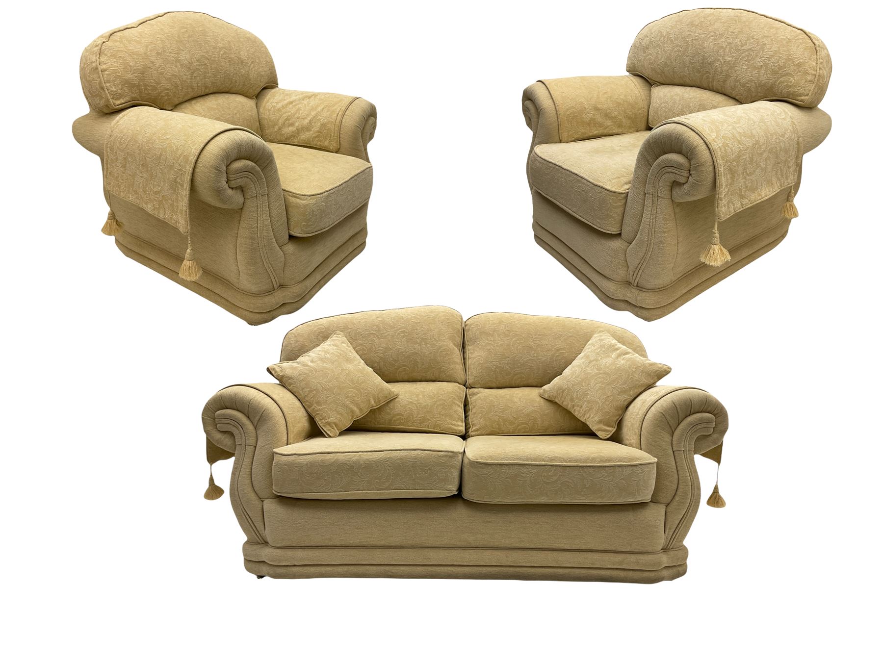 Three piece lounge suite upholstered in beige plain and embossed fabric
