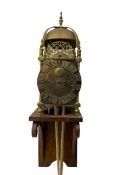 A 20th century replica of a 17th century 30-hour lantern clock with a rope driven verge escapement a