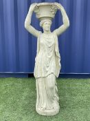 Composite stone classical figure of a woman with raised basket planter
