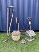 Various vintage and modern garden tools including