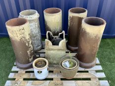 Collection of six Victorian terracotta chimney pots and three small plant pots