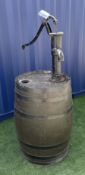 Coopered barrel with cast metal water pump