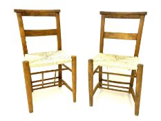 Pair early 20th century beech and elm chapel chairs with rush seats