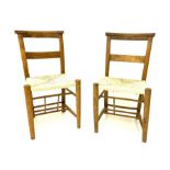 Pair early 20th century beech and elm chapel chairs with rush seats