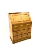 Pine bureau fitted with fall front and three drawers