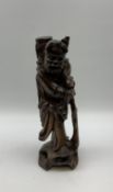 Chinese carved wooden figure of a traveller H36cm.