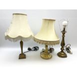 Three brass effect table lamps