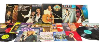 Quantity of vinyl records to include an Elvis Presley Greatest Hits box set and other records by Elv