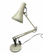 White metal angle poise type desk lamp.