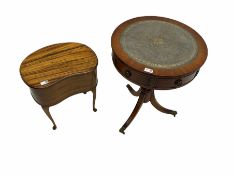 Reproduction mahogany drum table with leather inset