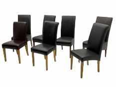 Seven high back leather dining chairs