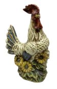 Large ceramic cockerel with sunflowers around the base