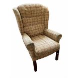 Wing back chair upholstered in beige check fabric