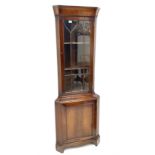 Late 20th century mahogany corner display cabinet