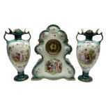 Three piece ceramic clock garniture