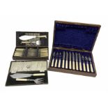 Silver plated fish knives and forks in hardwood case with brass inlay along with another cased set o