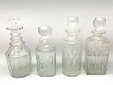 Four Victorian and later clear glass decanters