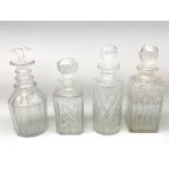 Four Victorian and later clear glass decanters