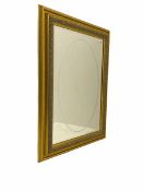 Gilt framed wall mirror