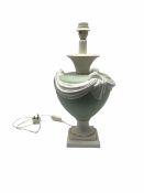 Sage green table lamp with white ribbon decoration